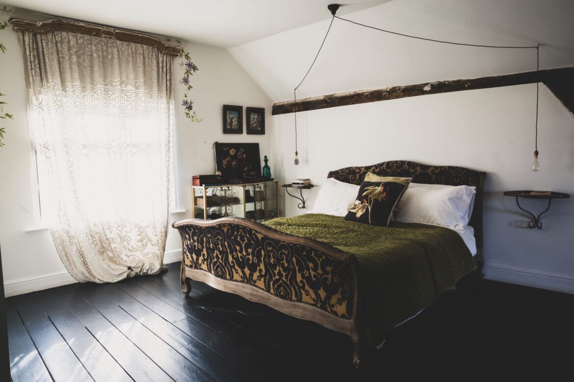 French inspired bedroom design with vintage bed