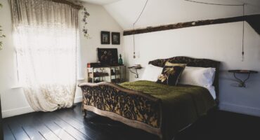 French inspired bedroom design with vintage bed