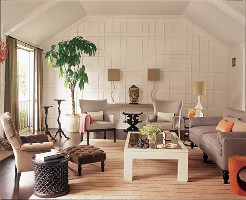 Try adding wood trim to your walls to add depth and break up tall wall open spaces.
