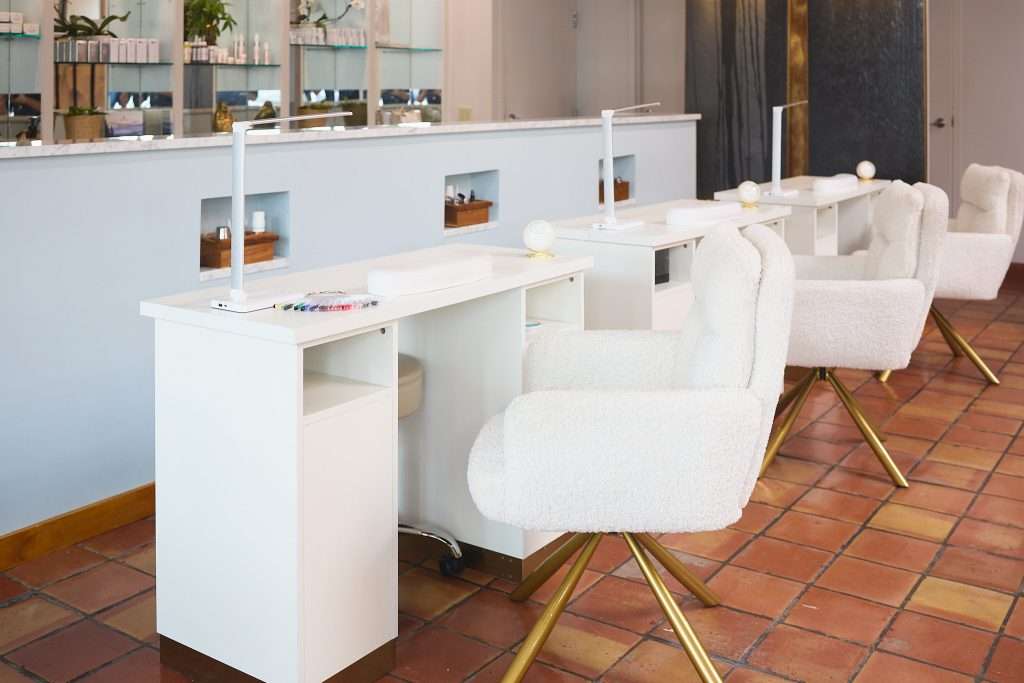 Aurora Spa 7 Wide view of manicure and nail tech stations at Aurora Spa in Minneapolis