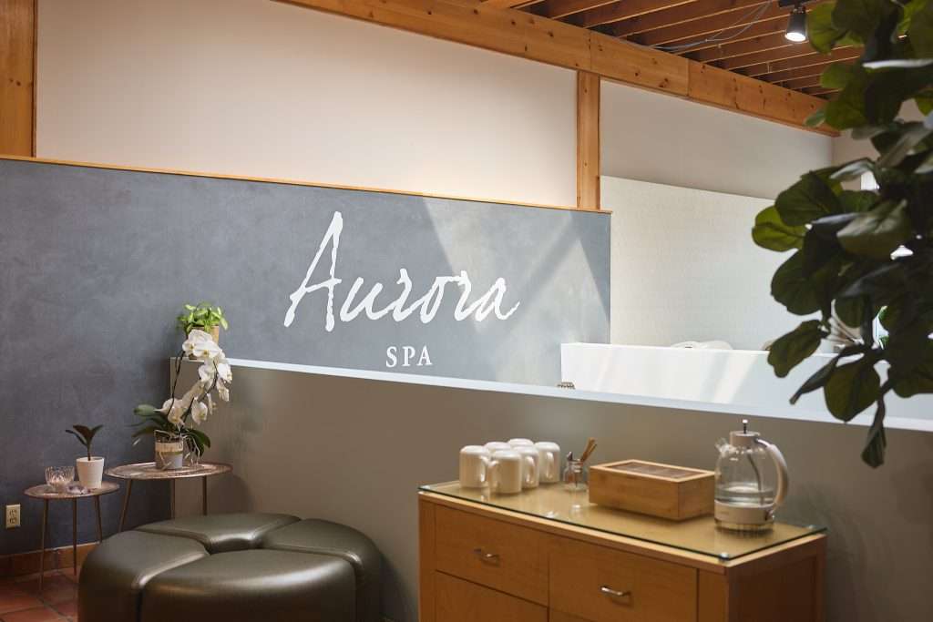 Aurora Spa 2 Aurora Spa sign on interior of spa waiting area. Minneapolis wellness spa