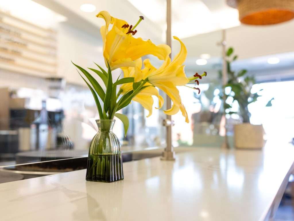 Oh Crêpe! Creperie & Café 19 Yellow flowers in a glass vase
