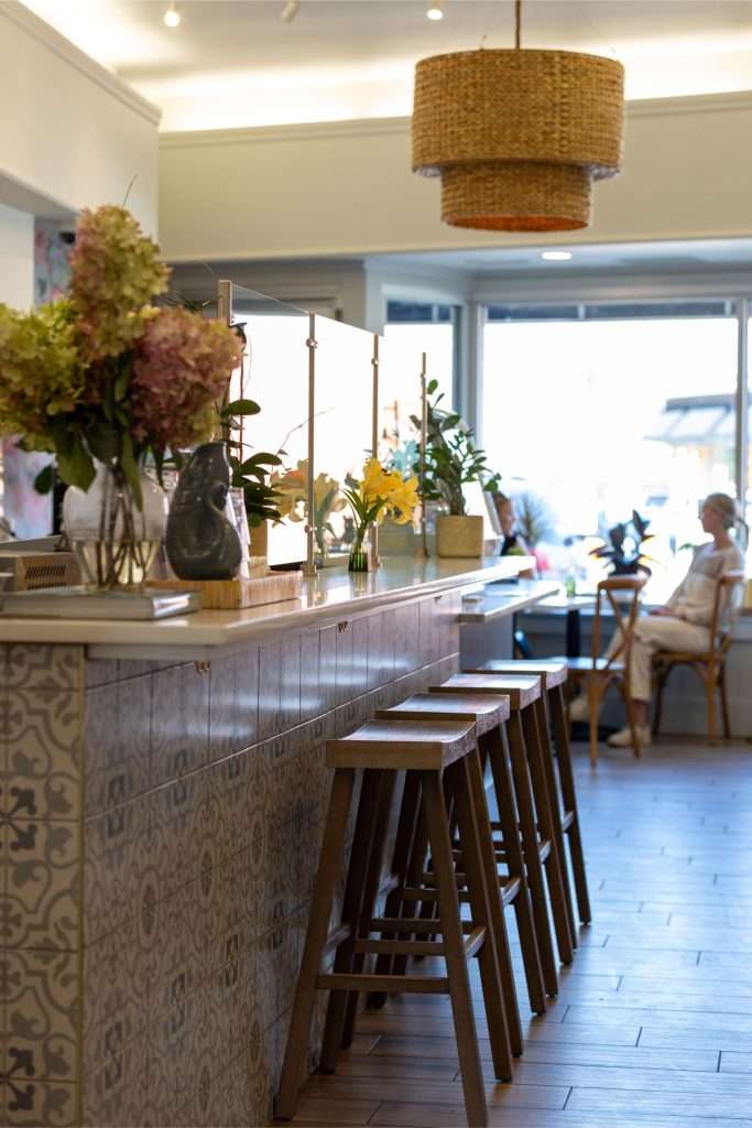 Oh Crêpe! Creperie & Café 13 Cozy cafe interior with floral decor. Bar Seating at Oh Crepe