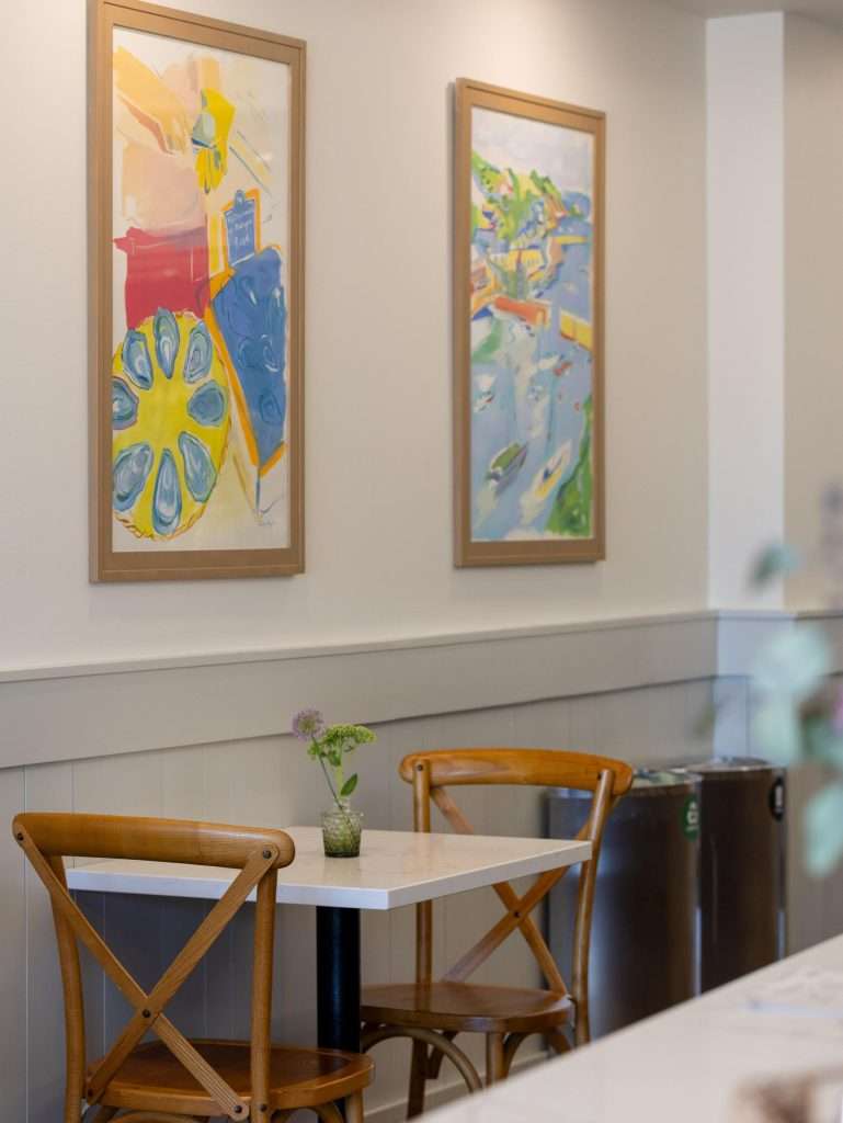 Oh Crêpe! Creperie & Café 12 Cozy cafe at Oh Crepe Edina with colorful artwork on the wall