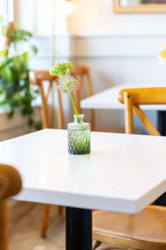 Oh Crêpe! Creperie & Café 6 Small vase with flowers on table
