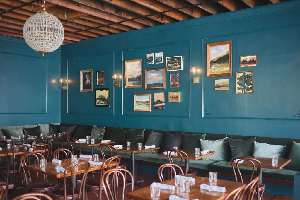 Minneapolis Restaurant Design 11 Cozy restaurant with teal walls in uptown Minneapolis